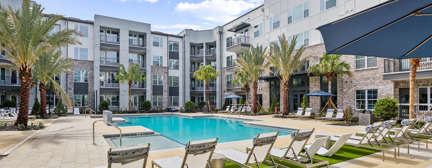 a pool with chairs around it