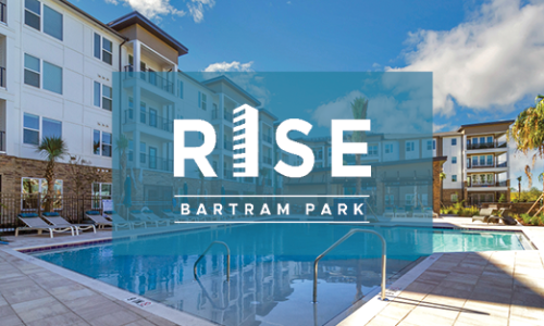 a pool in a courtyard and a logo on top of it