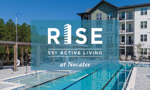 a resort-style pool with a building behind it and a logo on top of it